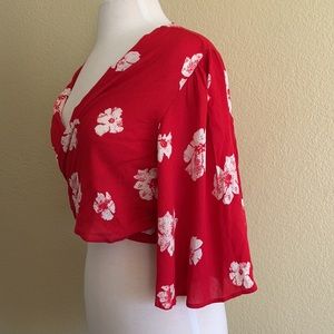 Red Blouse Criss Cross Tie. Floral. Large
